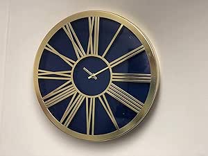 Round golden wall clock roman numeral