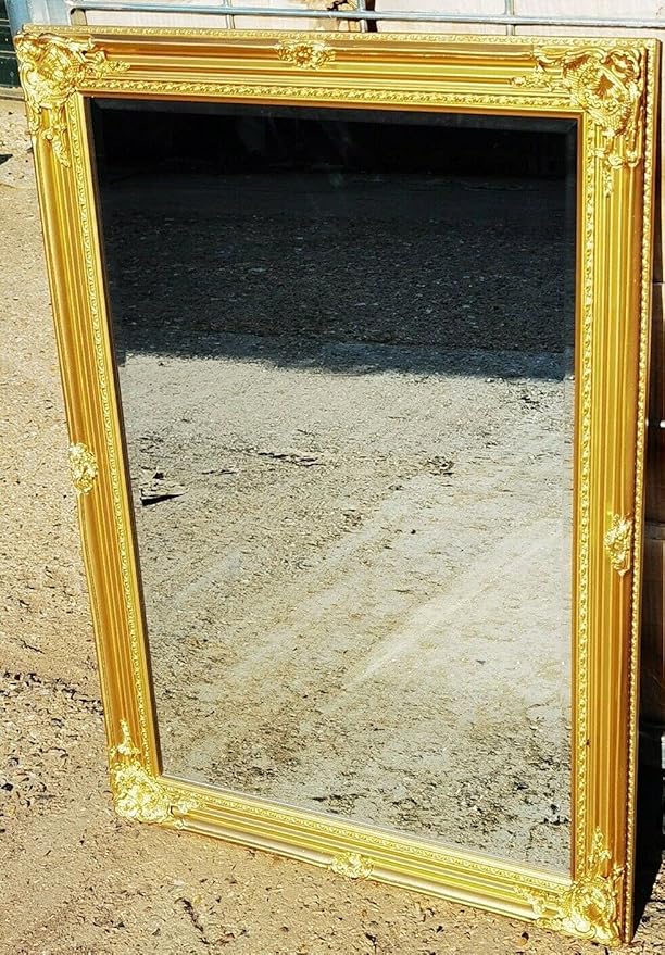 Antique gold wall mirror ornate design