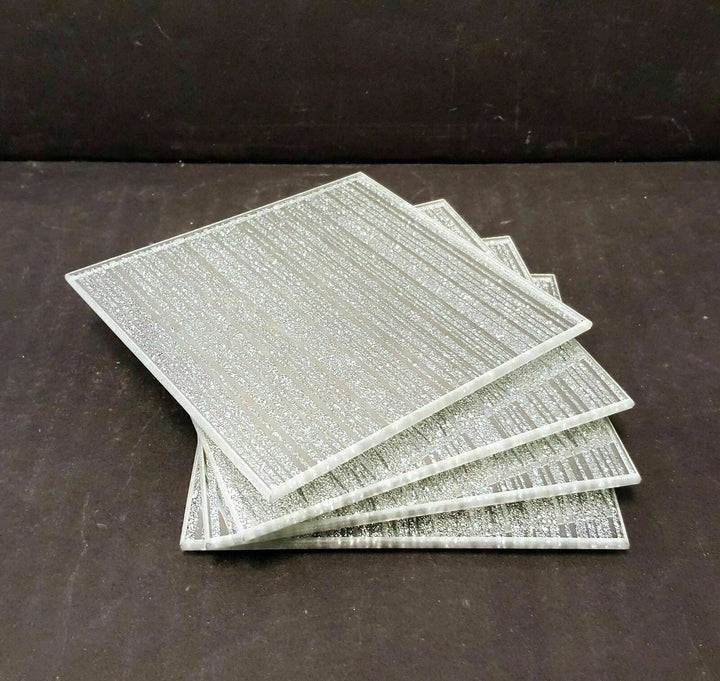 silver sparkle mirrored glass coaster set dining table