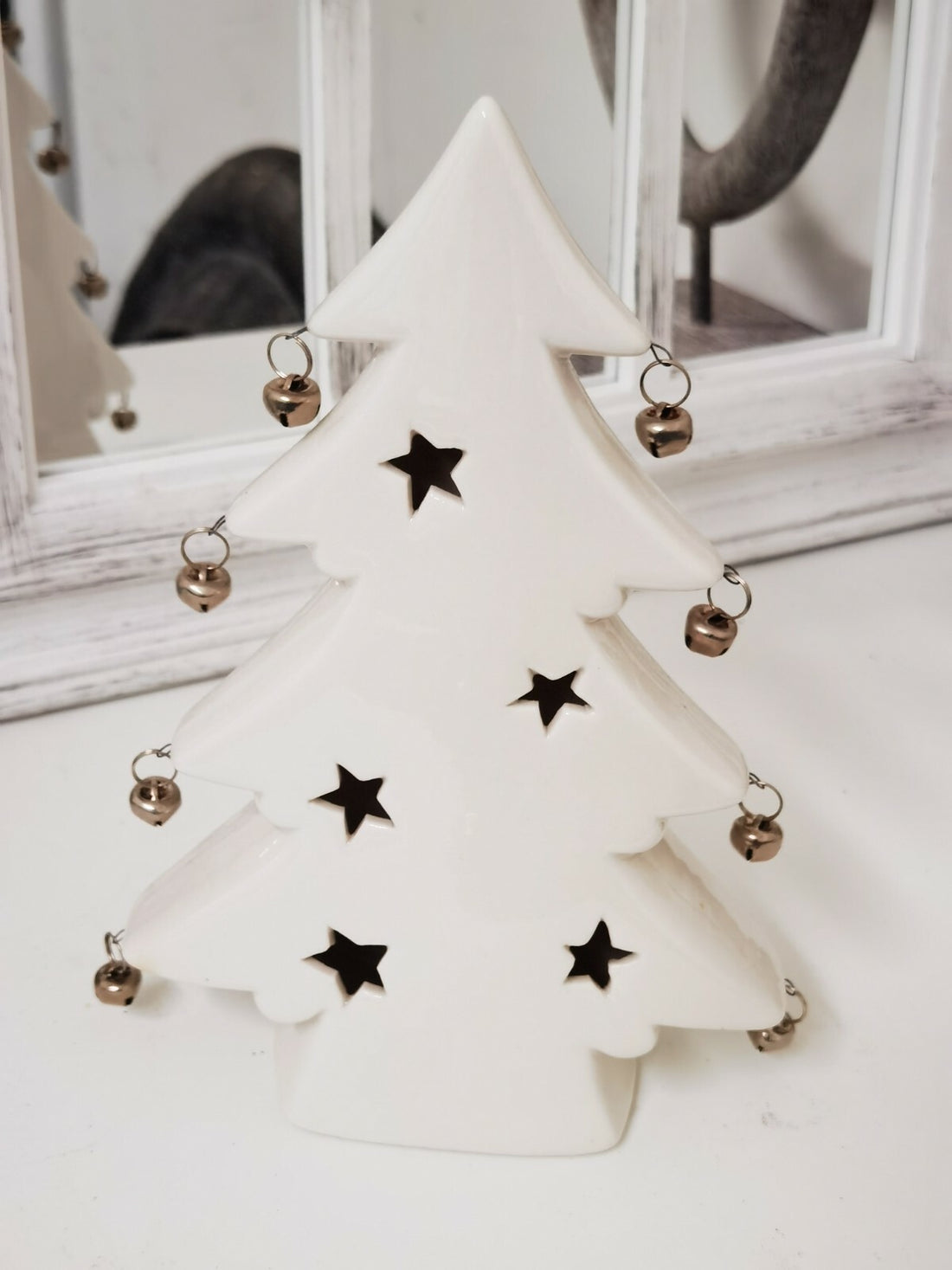 White artificial Christmas tree modern holiday décor display